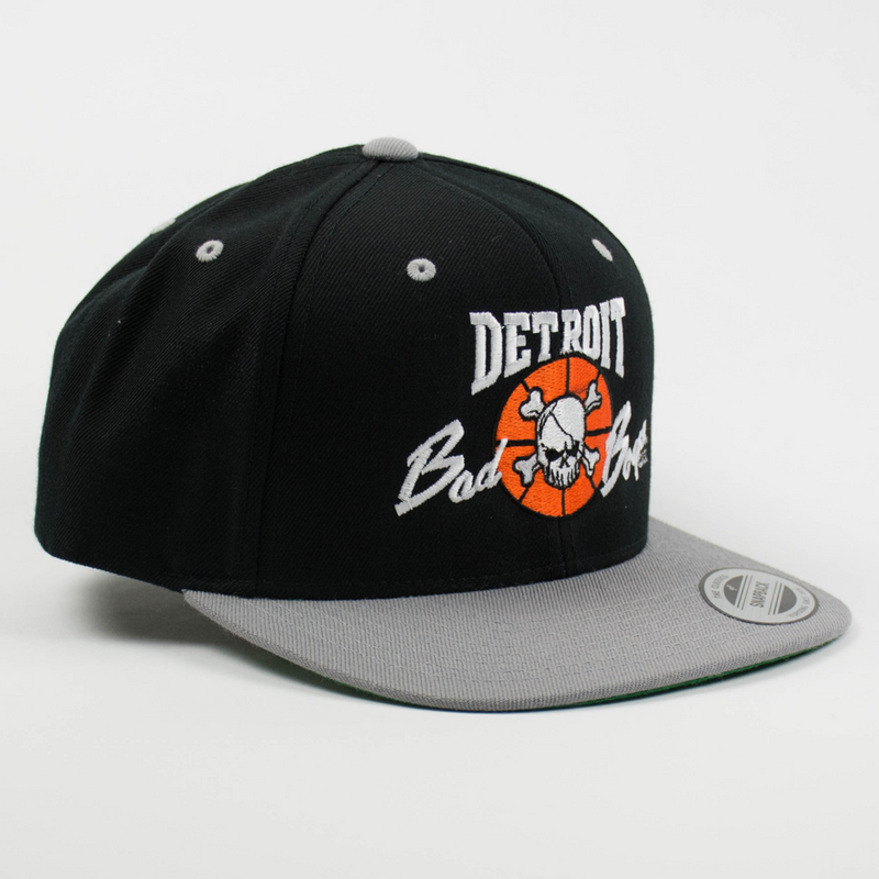 Officially Licensed Detroit Bad Boys Snap Back Hat - Black with Grey Bill (side view)
